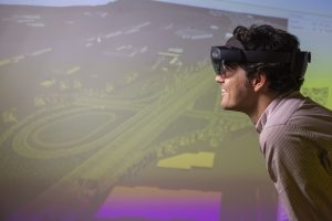 4_User-checking-out-a-model-of-the-I-66-US-highway-with-virtual-reality-goggles-300x200.jpg