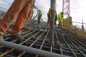 close-up-of-men-pouring-concrete-crop-300x200.jpg