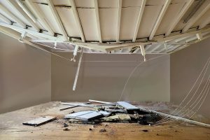 failed-truss-partially-collapsed-roof-1227-2-300x200.jpg