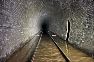Flood-water-in-Whitehaven-tunnel-containing-iron-ochre-300x200.jpg