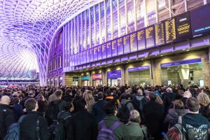 A stock photo showing crowded Kings Cross station in the city. Hundreds people waiting for the train, with delays and cancellations as Storm Doris lashes UK